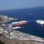 View of Santorini Athinios Port, with ferries leaving the dock.