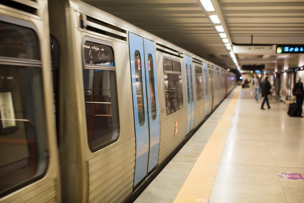 Lisbon airport Metro train departing from the platform is a budget friendly option to get from lisbon airport to sintra but you will need to make a change along the way.