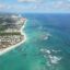aerial view of the green and blue waters along the coast of Punta Cana in the Dominican Republic