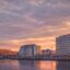 purple and orange sunset over Belfast city buildings and waterways