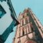 coventry city view of blue sky and tops of buildings, shot from ground looking up