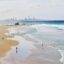 people in daytime taking a dip and walking on the beach, milky waves splashing onto the shore in Golast Coast