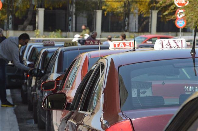 taxi cab patras burgandy local cabs lined up at a taxi rank in patras