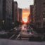 golden hour photo of a city as the world goes by