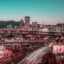 aerial post sunset long exposure shot of city lights and tall buildings