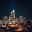 Charlotte skyline at nighttime feauturing many city lights