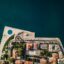 drone view of Zadar buildings by body of water in daytime