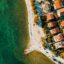 daytime bird's eye view photo of city buildings with orange roofs by body of water in Zadar Croatia