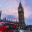 London city centre, an image of Big Ben and a red double-decker bus driving by.