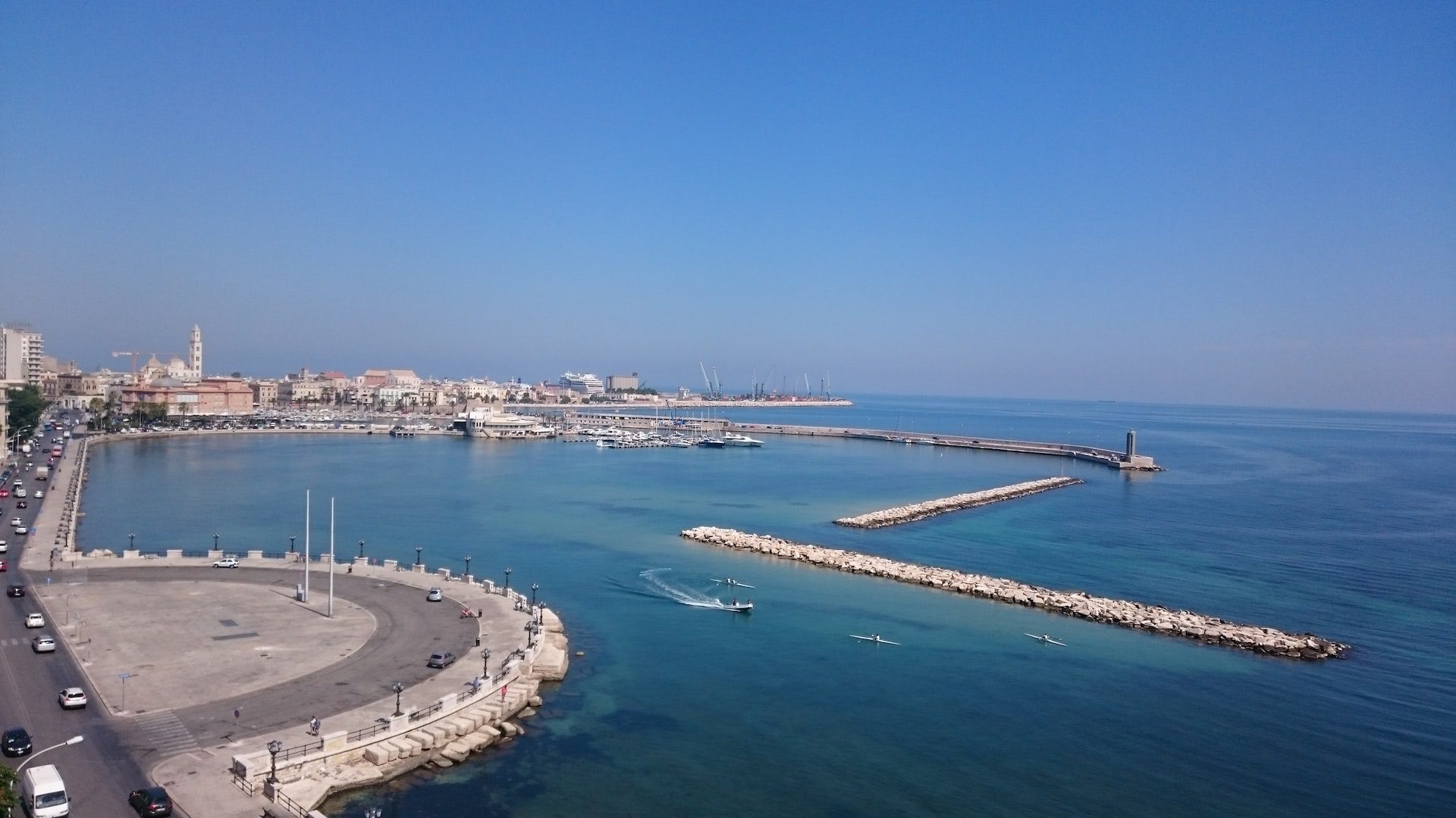 aerial shot of the coastline under a clear sky