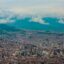 wide view of clouds, moutains, and homes in La Paz