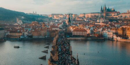 Panoramic view from Charles Bridge tower, overlooking the Vtlava River and central Prague.