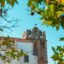 Faro Bell Tower with blue skies above.