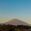 A view of Kilimanjaro against a sunset sky.