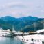 The photo highlights a relaxing coastal view in Tivat, making it a convenient location for visitors traveling from Tivat Airport to Tivat city center.