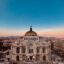View of Mexico City Centre at dusk, with blue and pink skies above.
