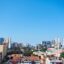 View of Maputo' city's skyline, with blue skies above.