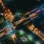 Aerial view of a city crossroad lit up at night