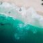 Aerial view of coastal waters lapping ashore in Bunbury, Australia.