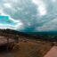 Cloudy Charlottesville sky overlooking the valley and people at picnic tables