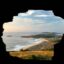 View from inside a rock cave to oceanside Ferrol coast.