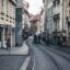 A curved street in Graz lined with tall buildings