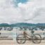 Bicycle leaning against a railing overlooking off shore Nha Trang.
