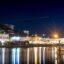 Night view of waterside buildings and lights in Townsville.