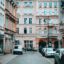 Tall buildings surround a street in Bydgoszcz.