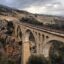 Scenic bridge towering on a rocky cliff in Adana, Turkey.