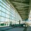Large windows line the sides of the terminal at Incheon Airport.