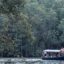 A boat on a waterway in Tanjung Rhu.