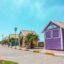 Colourful homes line a Jeffreys Bay roadway.
