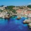 City of Dubrovnik on the coast, showing cliffs and a large body of water.