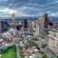 An aerial view of Denver City with lots of skyrise buildings.