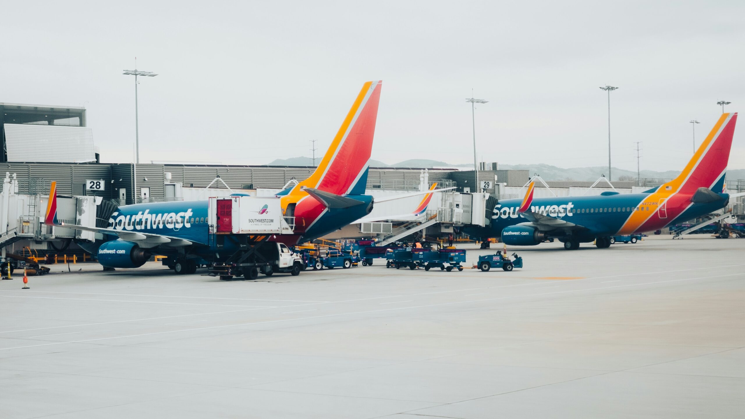 planes lined up at gates outside San Jose Airport
