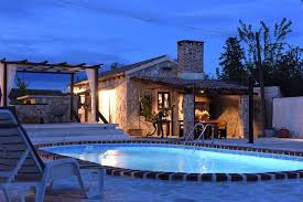 Night time view of the pool at Villa Palace Zadar