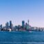 Calgary from across the water under a blue sky