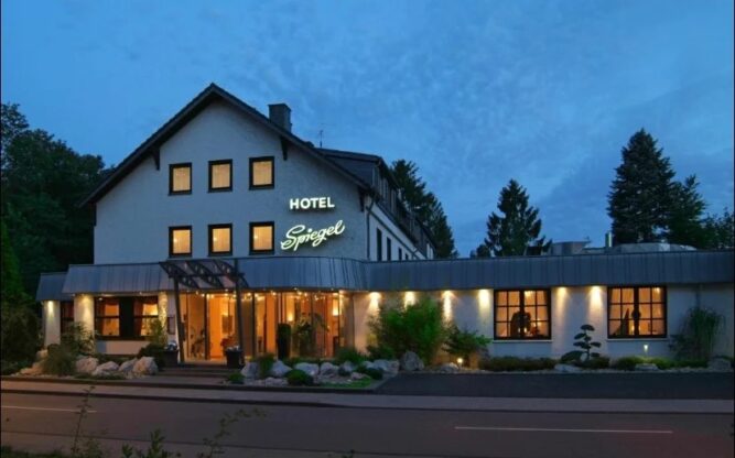Hotel Spiegel near Cologne Airport lit up at night