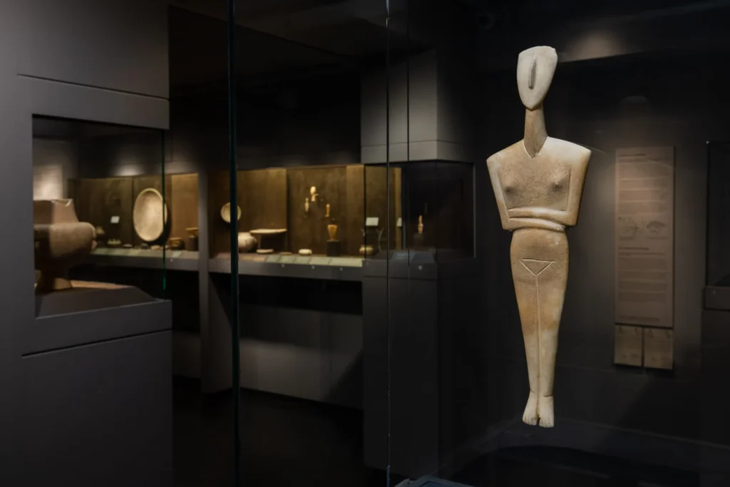 Cycladic marble figurines on display inside the Museum of Cycladic Art in Athens, Greece.
